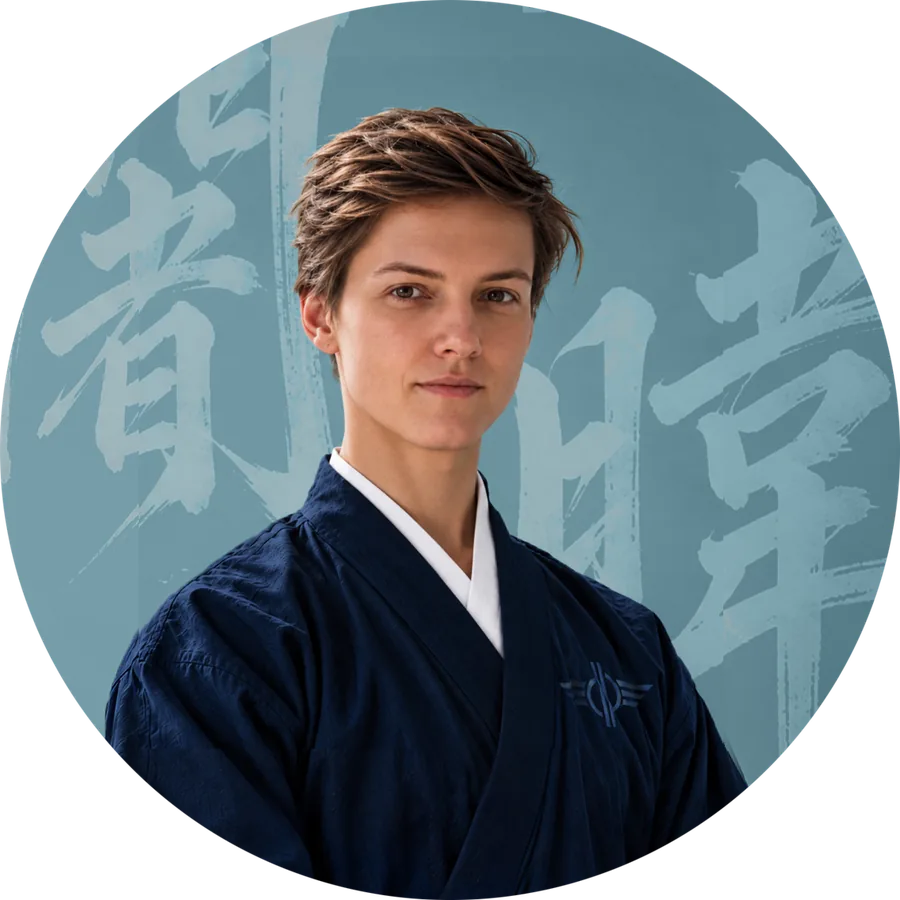 J. H. Tepley in a navy kimono against a teal calligraphy backdrop